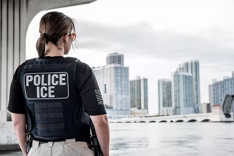 Image: An ICE ERO officer looks out over the Miami skyline.