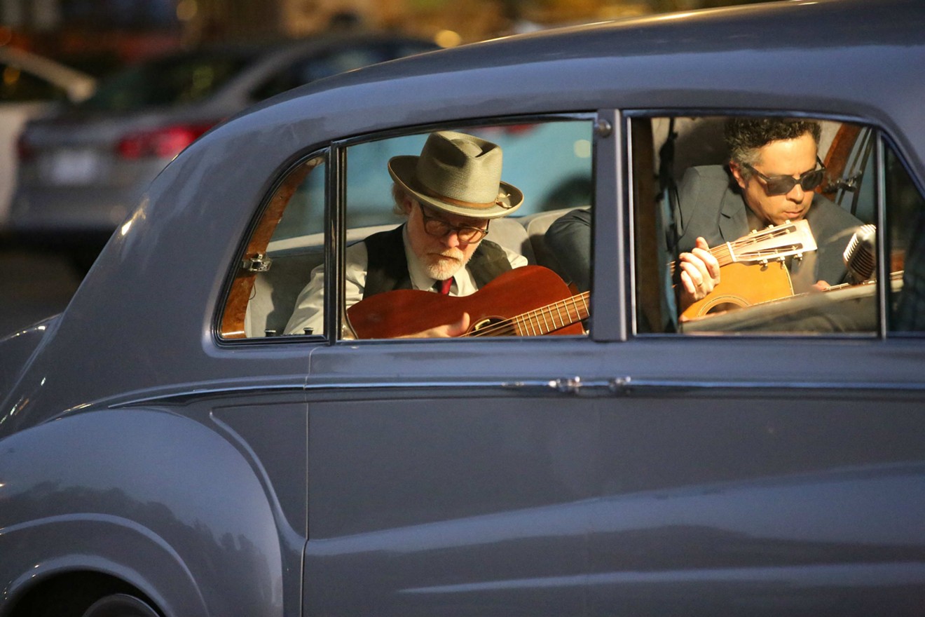 Musicians Mike Coykendall (left) and M. Ward are two of the artists who get the opportunity to sit in the back seat of Elvis Presley’s Rolls-Royce in The King, director Eugene Jarecki's restless documentary.