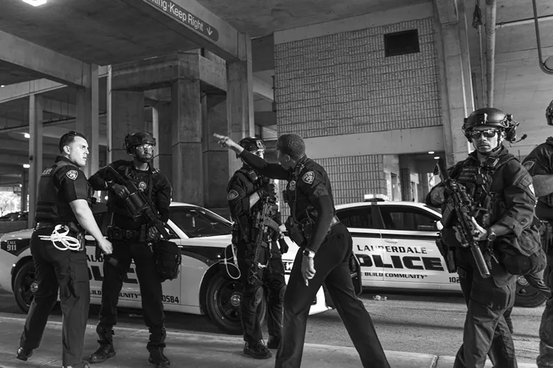 Fort Lauderdale police officer Krystle Smith admonishes fellow officer Steven Pohorence after he pushed a kneeling protester onto the ground during demonstrations in May 2020.