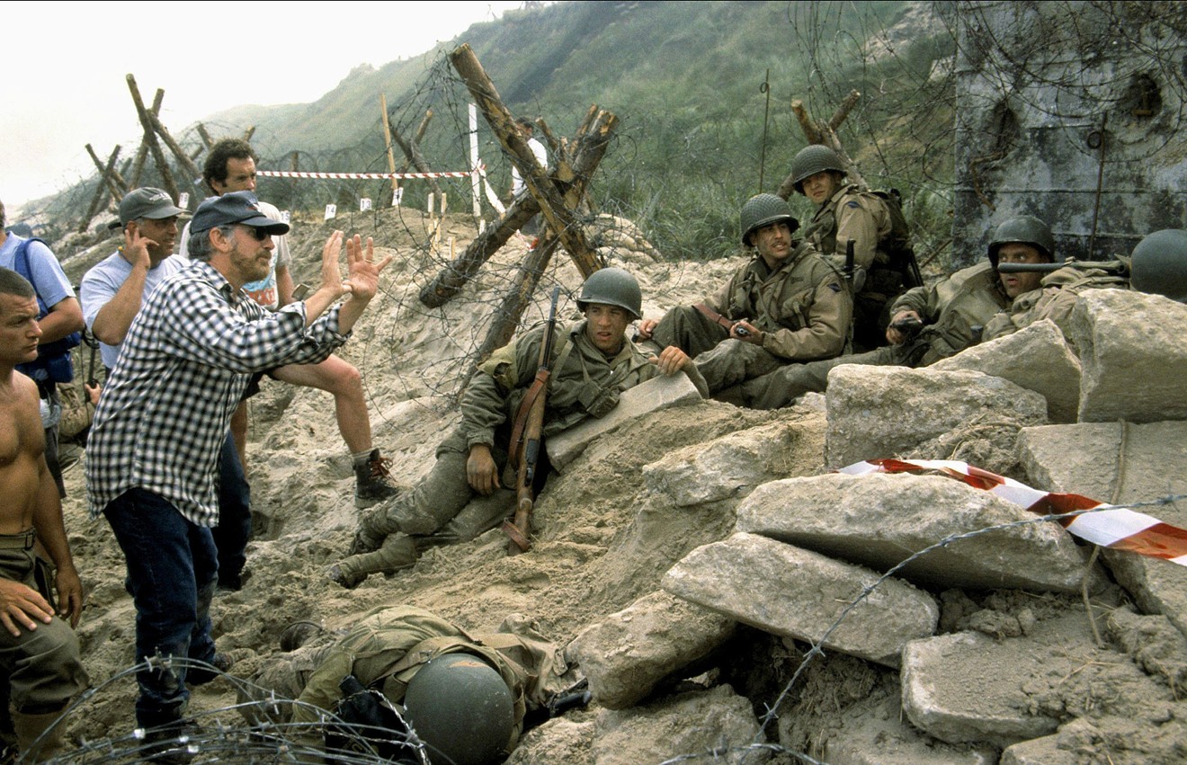 On the set of Saving Private Ryan in 1997, director Steven Spielberg  consults with actors Vin Diesel, Barry Pepper, Adam Goldberg and Tom Sizemore.