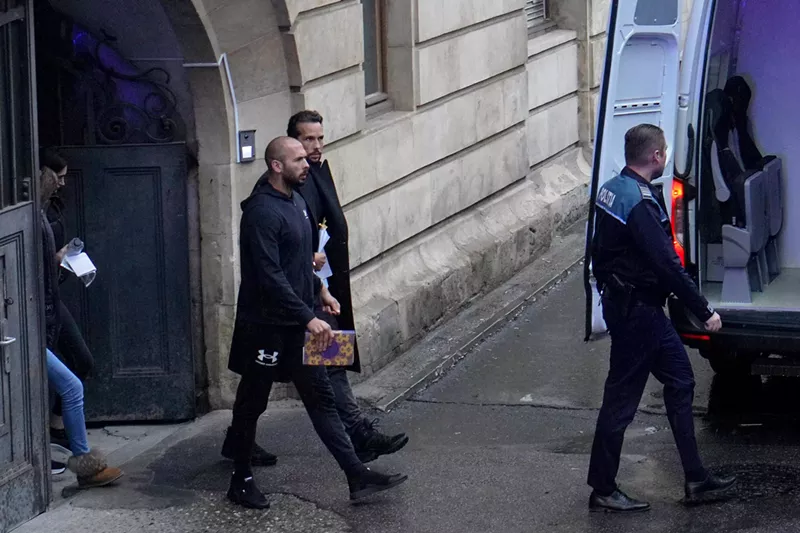 Image: Andrew Tate and Tristan Tate leave the Bucharest Court of Appeal on January 10, 2023 in Romania.