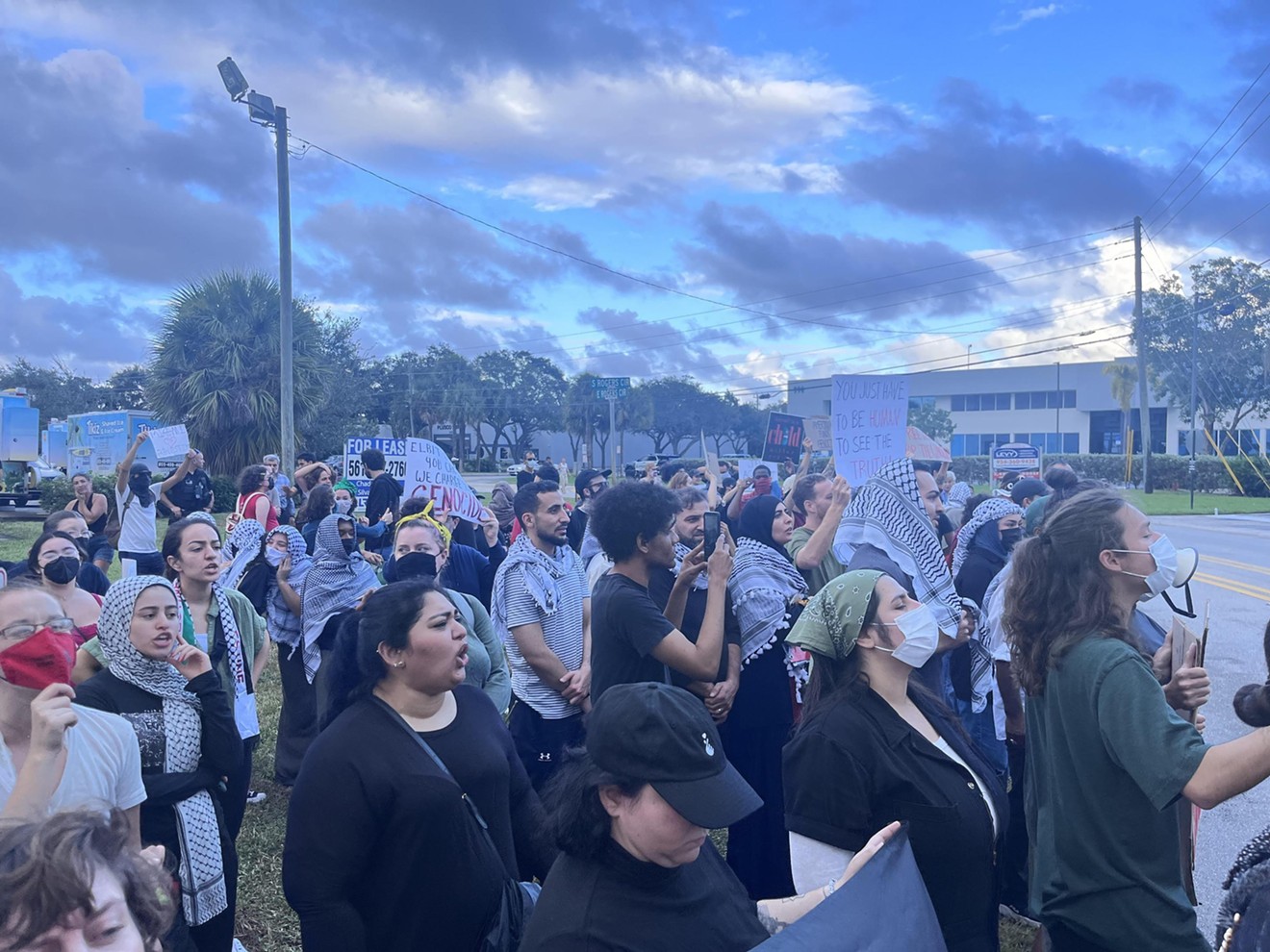 Opponents protesting Israeli airstrikes in Gaza gather outside Real-Time Laboratories' offices in Boca Raton on November 9. (Photo was provided by a protester on the condition his name not be published.)