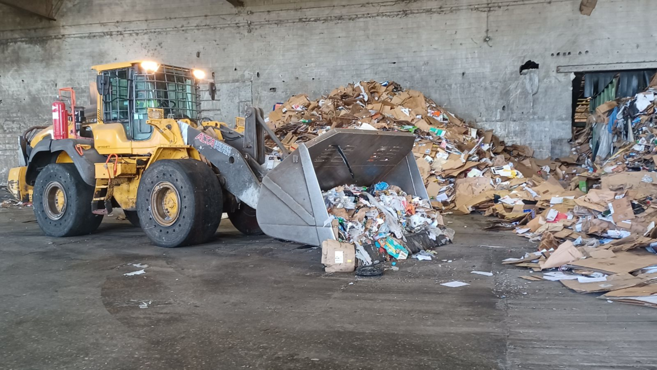 Recyclables from across South Florida arrive at the "tipping room" at Waste Management's recycling facility in Pembroke Pines to be sorted and processed for recycling.