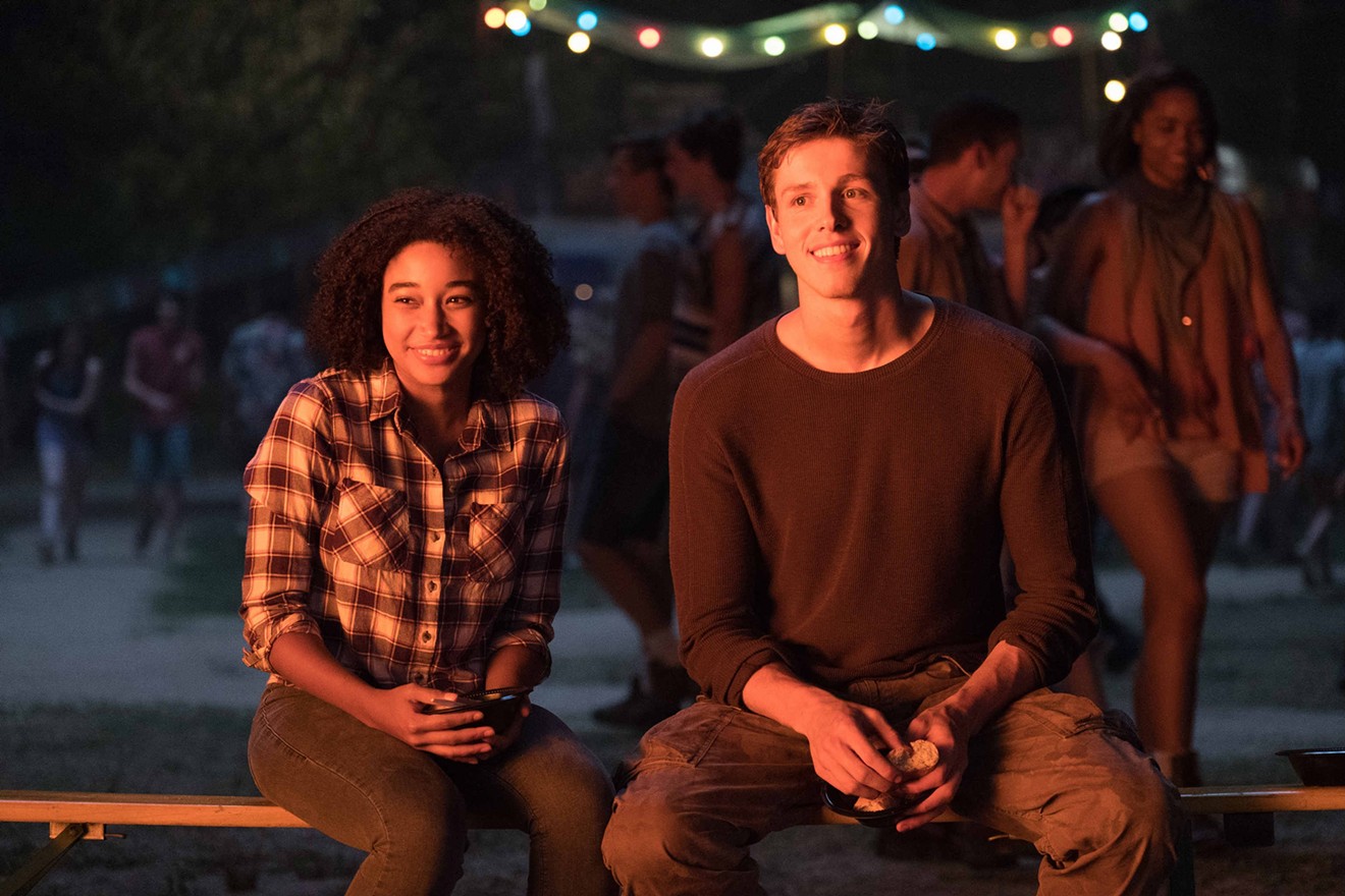 Amandla Stenberg (left) plays 16-year-old Ruby and Harris Dickinson is Liam, the boy she likes but can't kiss, in The Darkest Minds, Jennifer Yuh Nelson’s film about a band of superpowered teen misfits surviving in a dystopian America.