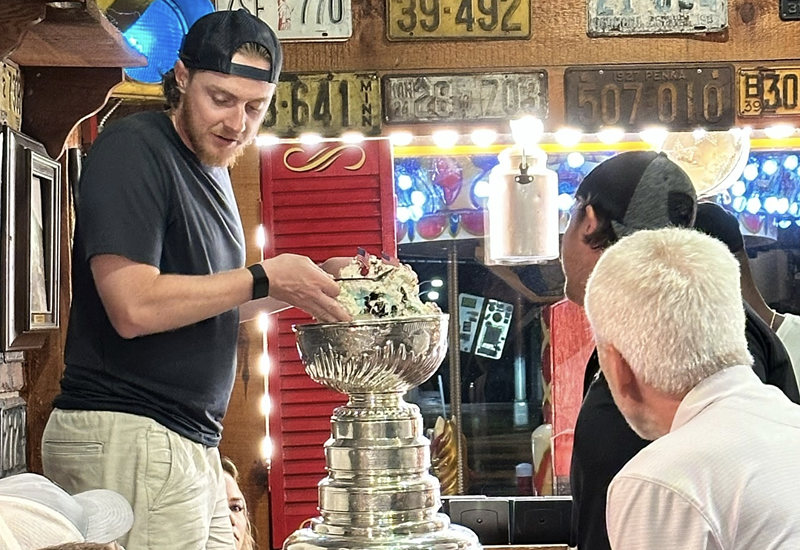 Image: man holding trophy