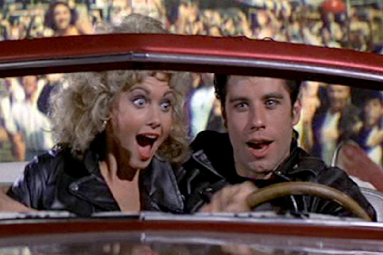 Olivia Newton-John and John Travolta reprise their roles from 1978's Grease for a singalong in West Palm Beach.