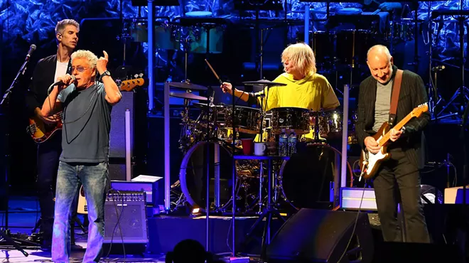 a grizzled ol' rock band on stage