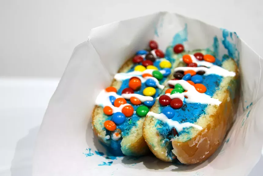 Doughnut ice cream sandwiches can be stuffed with brightly hued ice creams and a variety of toppings. - PHOTO BY NICOLE DANNA
