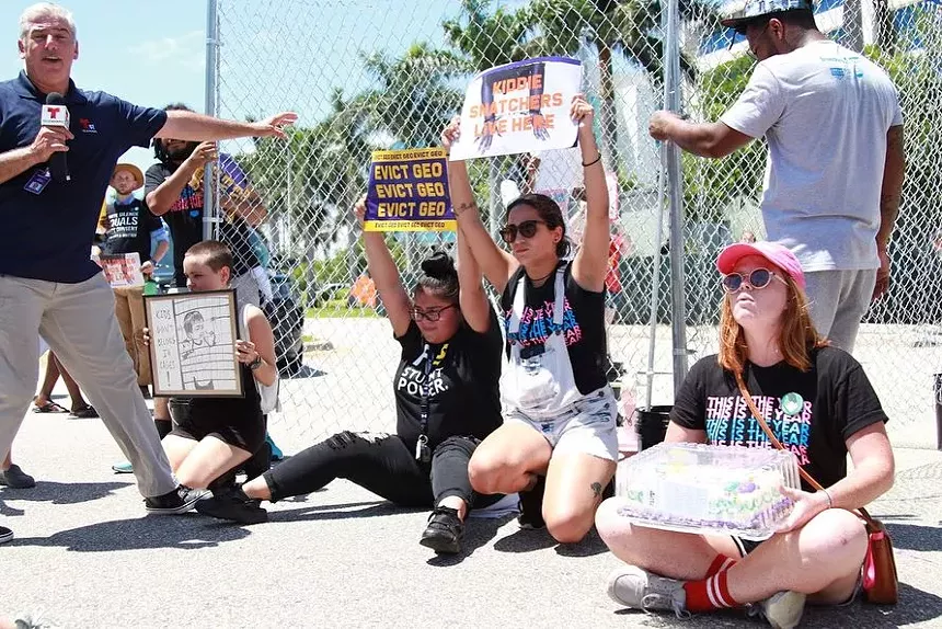 Here the Dream Defenders are pictured protesting the GEO Group, America's second largest private prison operator. - COURTESY OF THE DREAM DEFENDERS
