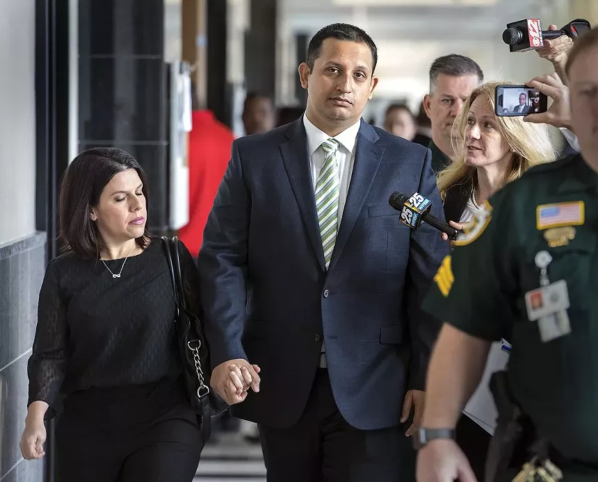Nouman Raja leaves court after a hearing this past January 26. - PHOTO © LANNIS WATERS/THE PALM BEACH POST VIA ZUMA WIRE