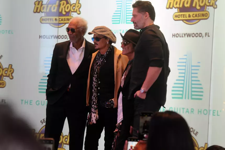 Guitar Hotel's debut featured red-carpet headliners Morgan Freeman (from left), Johnny Depp, Joe Perry, and Joe Manganiello - PHOTO BY KEVIN J. BERG