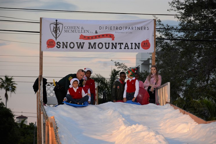 The 57th annual Christmas on Las Olas in Fort Lauderdale invites you to go sledding on its 70-foot hill. - PHOTO COURTESY OF LAS OLAS ASSOCIATION