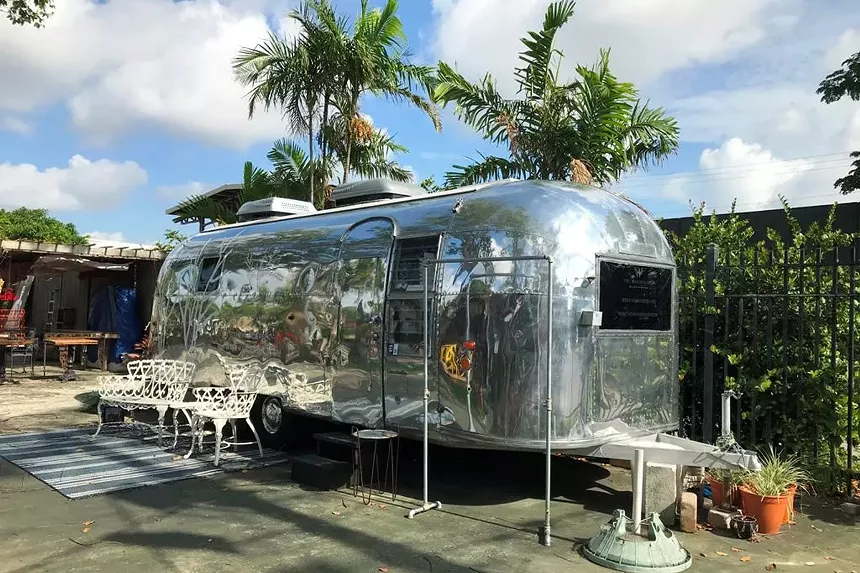 A Jetsons-era Airstream trailer occupied by the Wander Shop welcomes visitors to the Yard in Wilton Manors. - PHOTO BY WILLIAM FLOOD