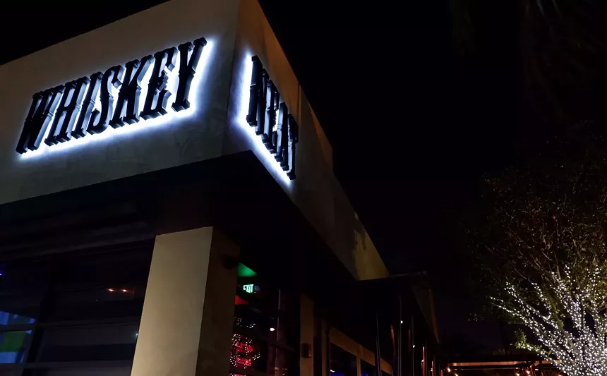 Adjacent Quarterdeck's brand-new spot off 17th Street, Whiskey Neat has big screens and big-flavor cocktails. - PHOTO BY JESSE SCOTT