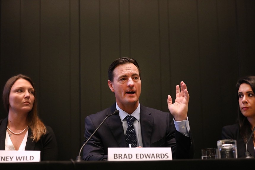 Epstein victim Courtney Wild (left) and her attorney Brad Edwards (right) appear at a news conference on July 16, 2019. - PHOTO BY SPENCER PLATT/GETTY