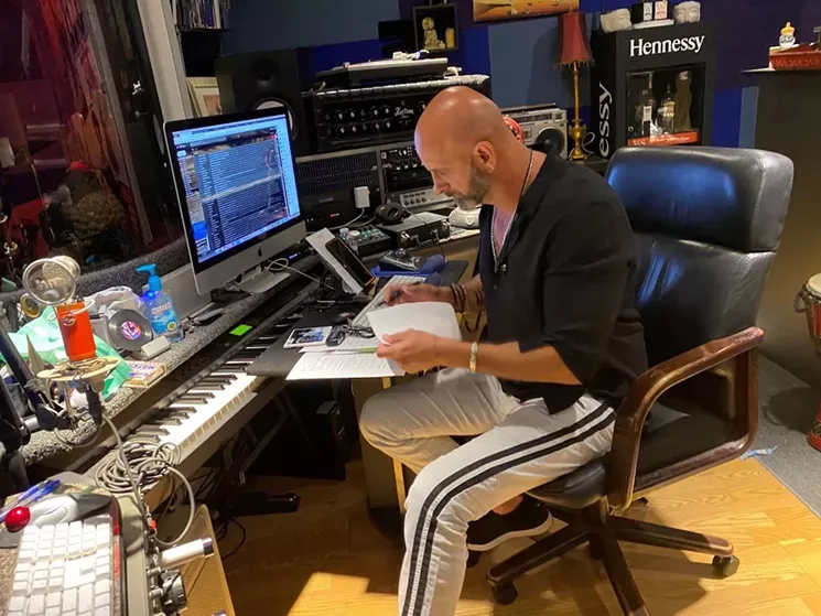 Marlow Rosado is hard at work in his Miami Lakes recording studio. - PHOTO COURTESY OF DEBORAH RAMIREZ