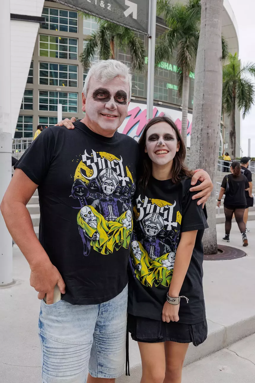 Father and daughter wearing face paint