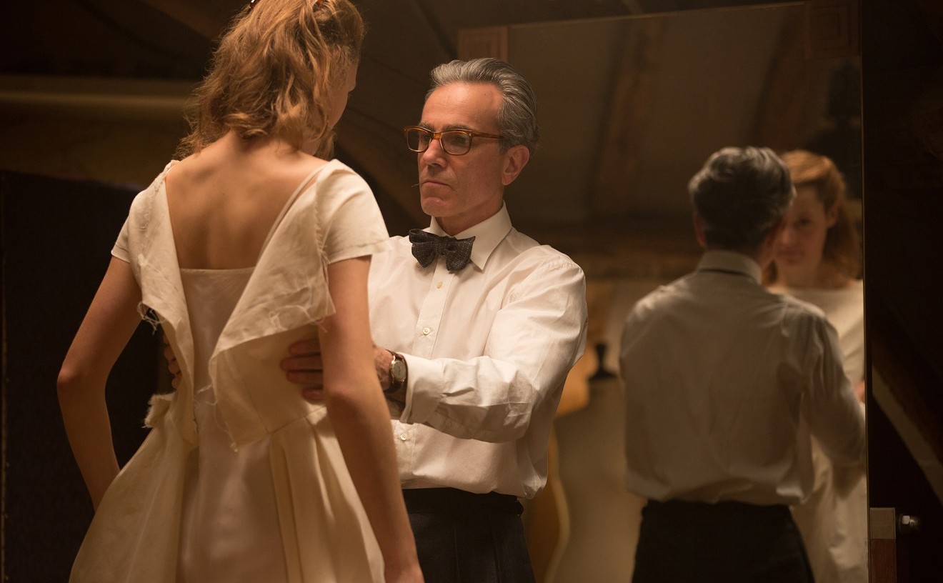 Daniel Day-Lewis (right) plays British fashion designer Reynolds Woodcock, who is immediately smitten with Alma (Vicky Krieps) in Phantom Thread, director Paul Thomas Anderson's  film that has the air of a chamber drama.